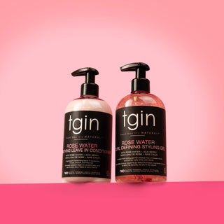 tgin Rose Water Smoothing Leave-In Conditioner and Curl Defining Styling Gel bottles on a pink background