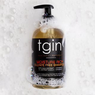 tgin Moisture Rich Sulfate Free Shampoo pump bottle surrounded by soap bubbles