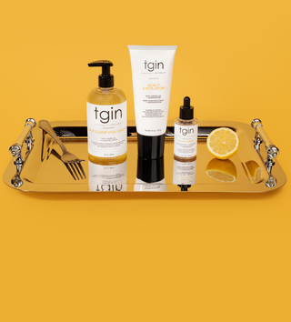 tgin Balance Collection products on a silver tray with lemons