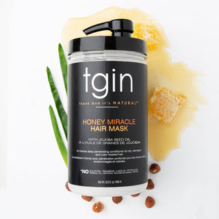 Jumbo pump jar of tgin Honey Miracle Hair Mask with honeycomb and aloe leaves