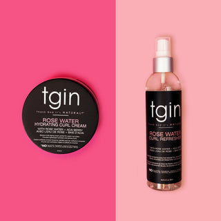 tgin Rose Water Curl Refresher spray bottle and Rose Water Hydrating Curl Cream jar on pink backgrounds