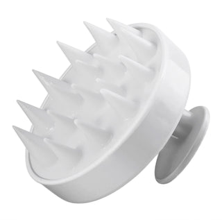 White silicone scalp massager, side view