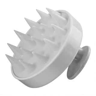 White scalp massager with soft silicone bristles, side view