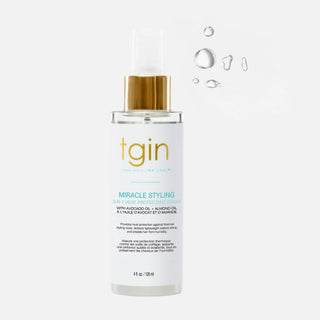 tgin Miracle Styling 3-N-1 Heat Protectant Spray bottle with water droplets