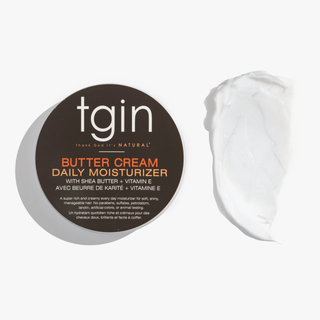 tgin Butter Cream Daily Moisturizer jar with a swatch of the cream