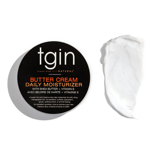 tgin Butter Cream Daily Moisturizer jar with a swatch of the cream