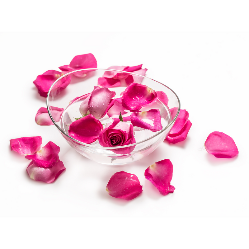 Pink rose petals in a glass bowl