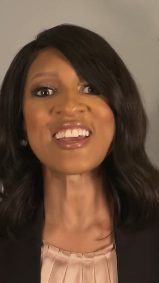 Smiling woman with shoulder-length dark hair in a black blazer, cover image for the tgin Foundation video
